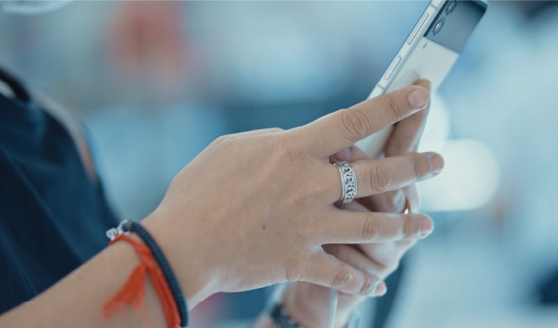 Woman holding a smart phone